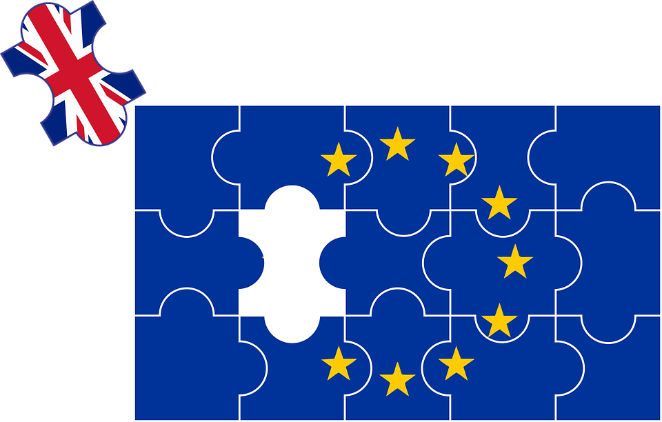A jigsaw puzzle of the EU logo with a piece with the Union Jack on it taken out