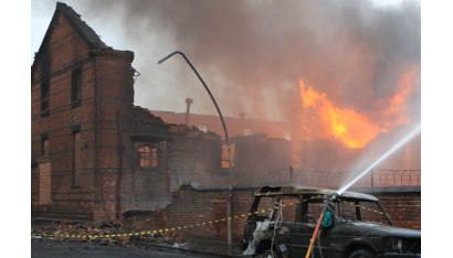 A burning building being put out.