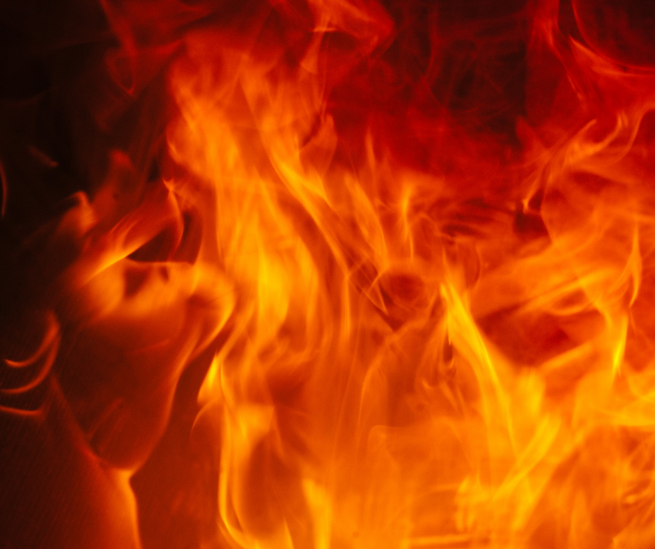 Swirling flames of a fire.