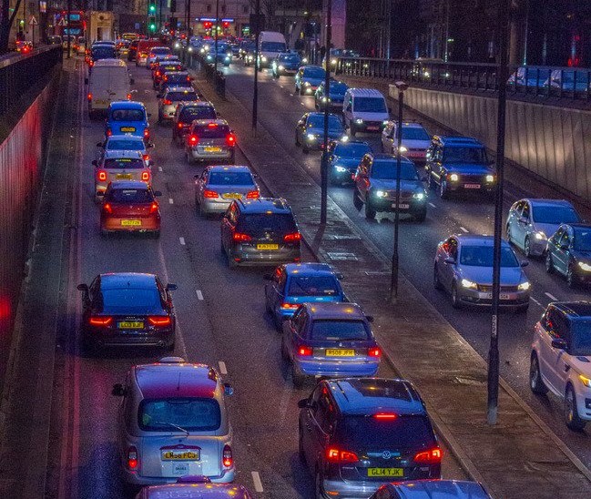 Rows of cars stuck in traffic.