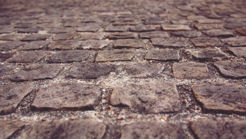 A cobbled uneven street.