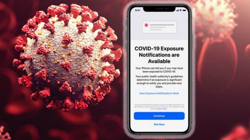An Iphone showing the contact tracing setting against a background of a virus under the microscope.