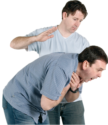 A man performing back blows on another man who is choking.