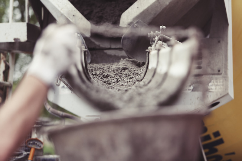 Cement flowing down a chute.