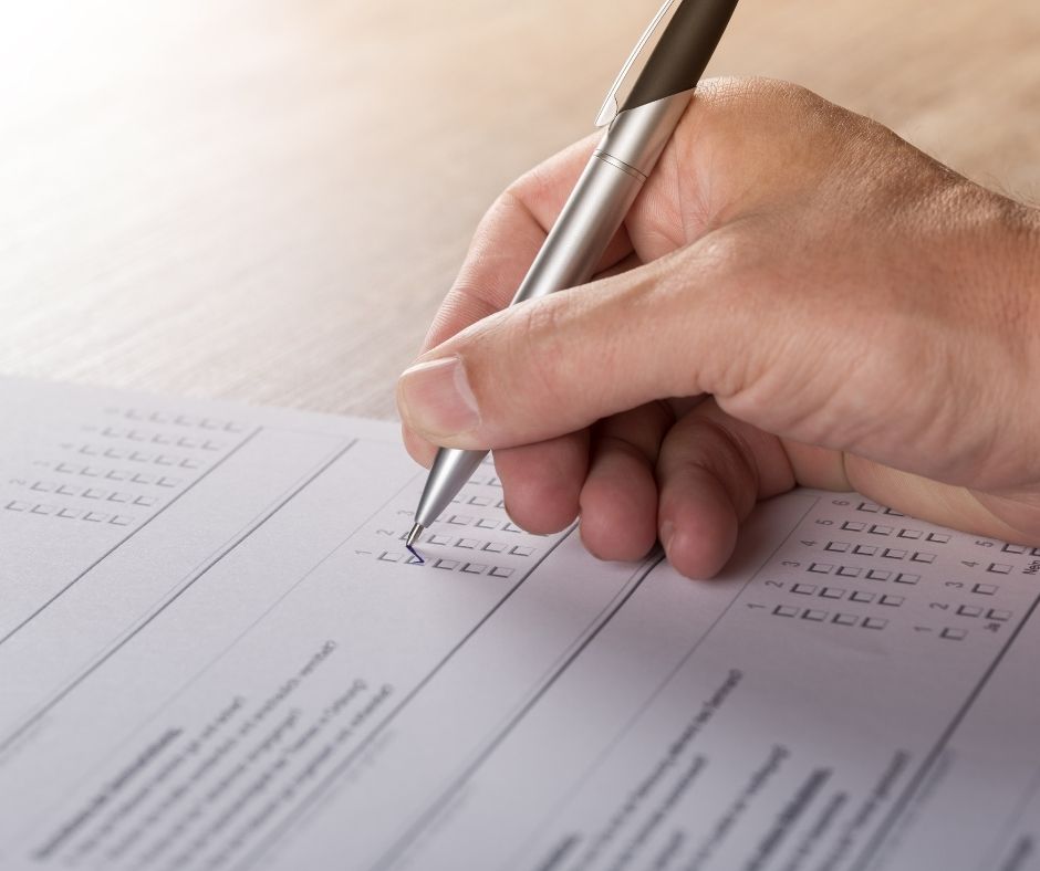 survey being filled in with a pen