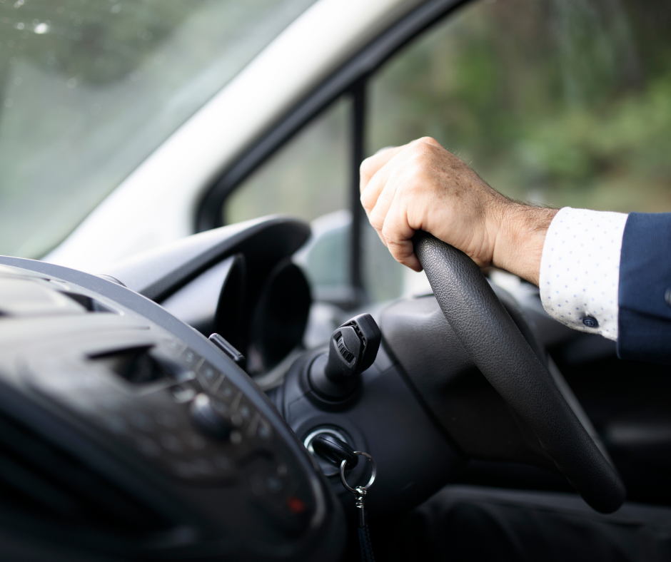 hands on a steering wheel