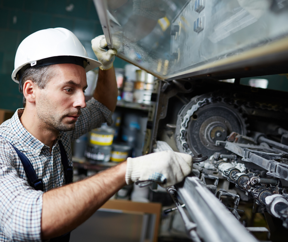 Man inspecting some machinery
