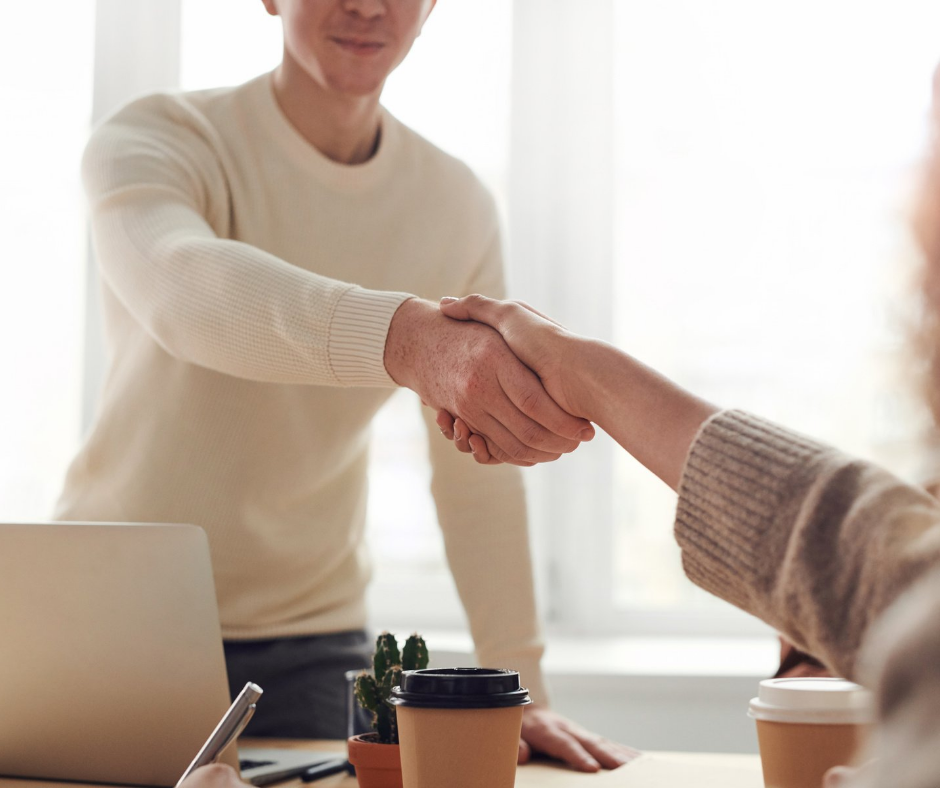Two people shaking hands