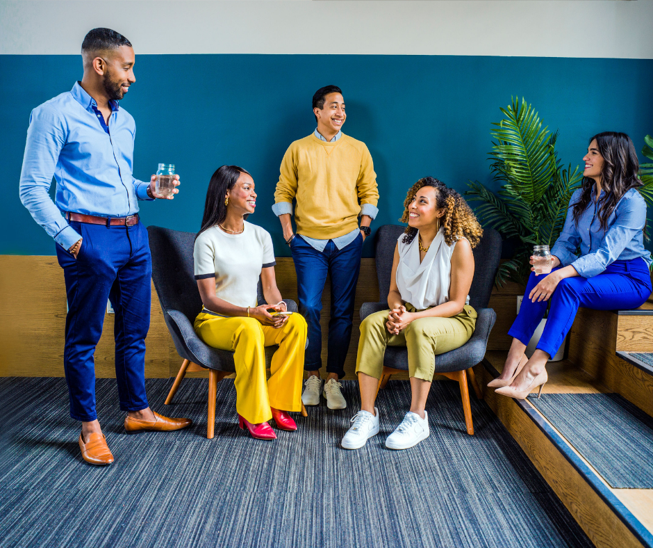 Group of 5 people having a conversation