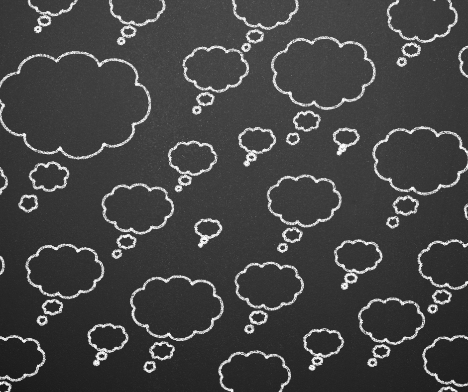 White thought bubbles on black background