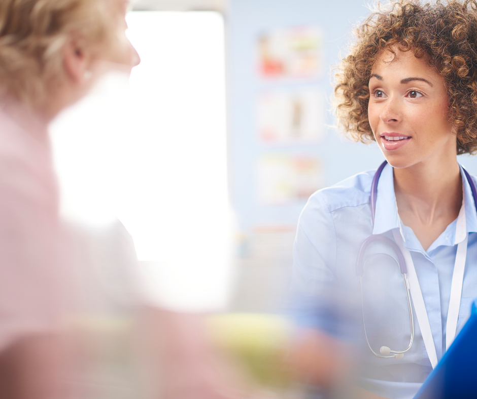 Female doctor talking to a patient