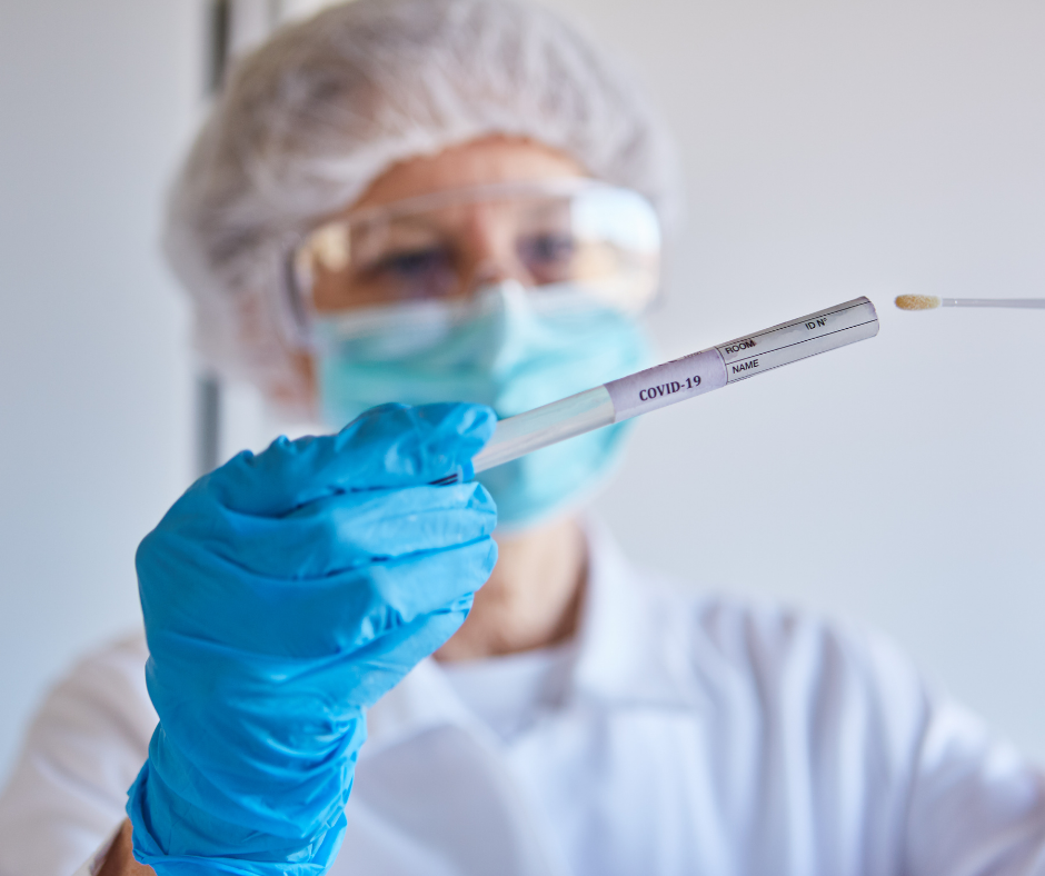 Covid tester processing a saliva sample
