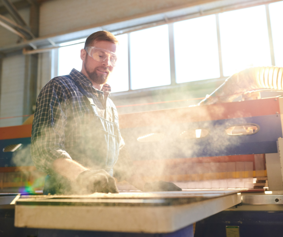 Man working in dusty workshop