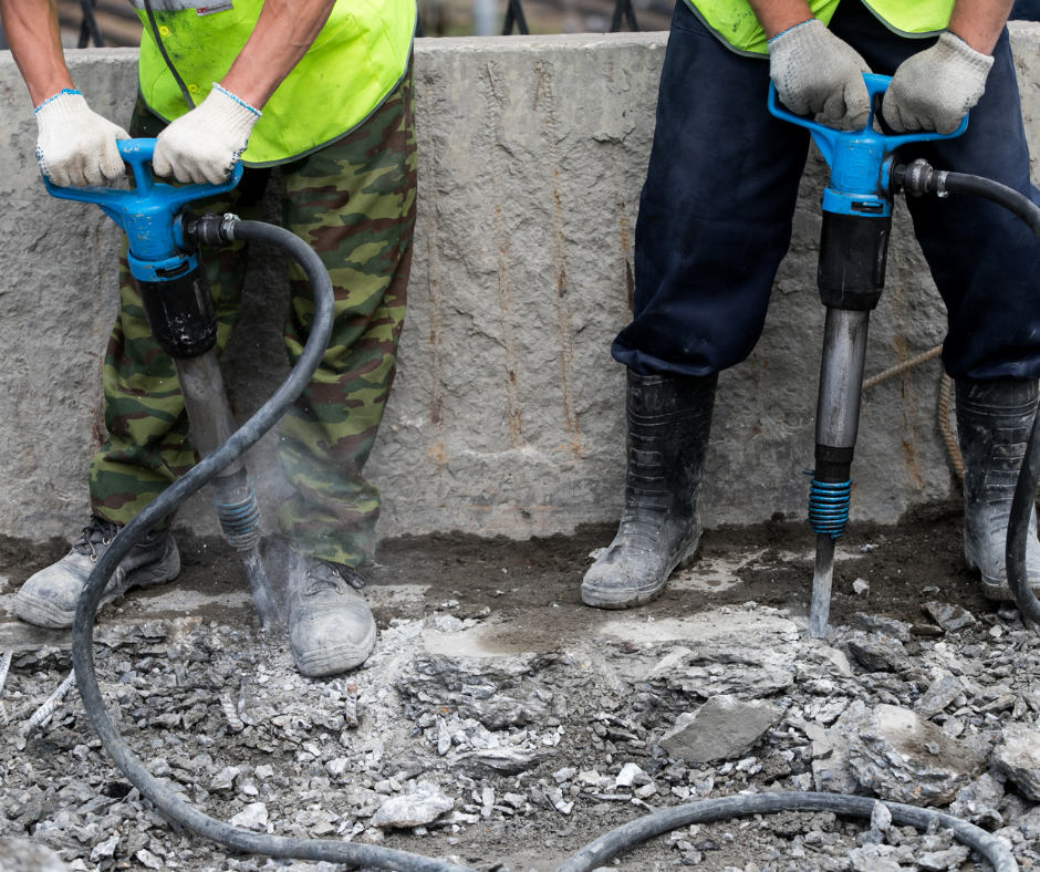 workers using pneumatic drills