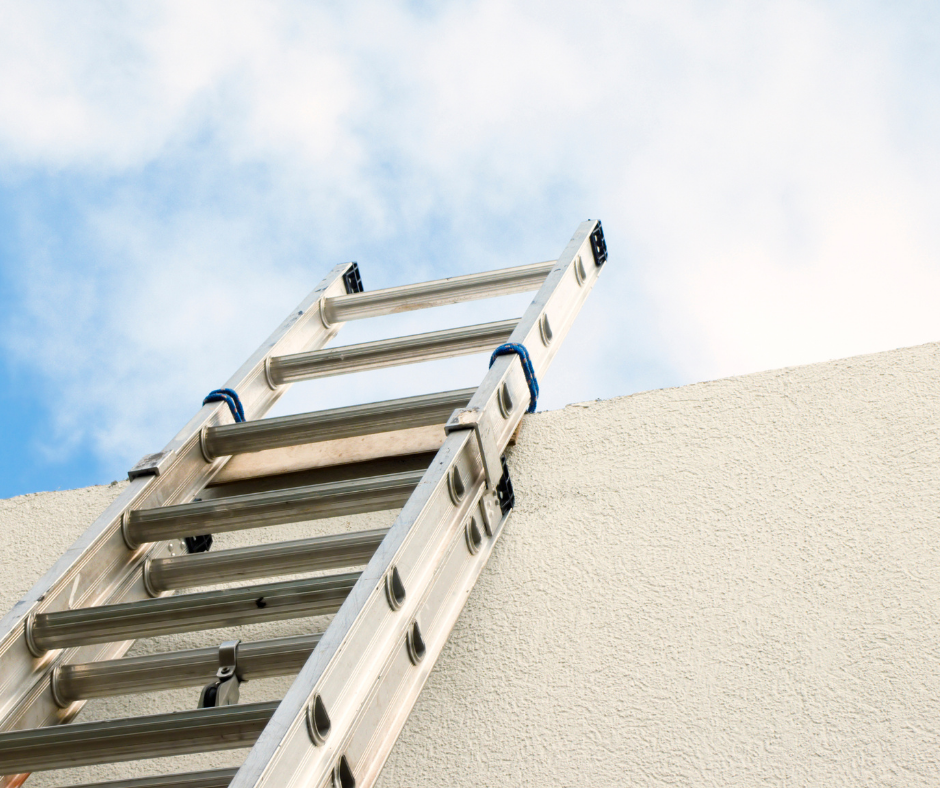 Ladder leaning on a wall