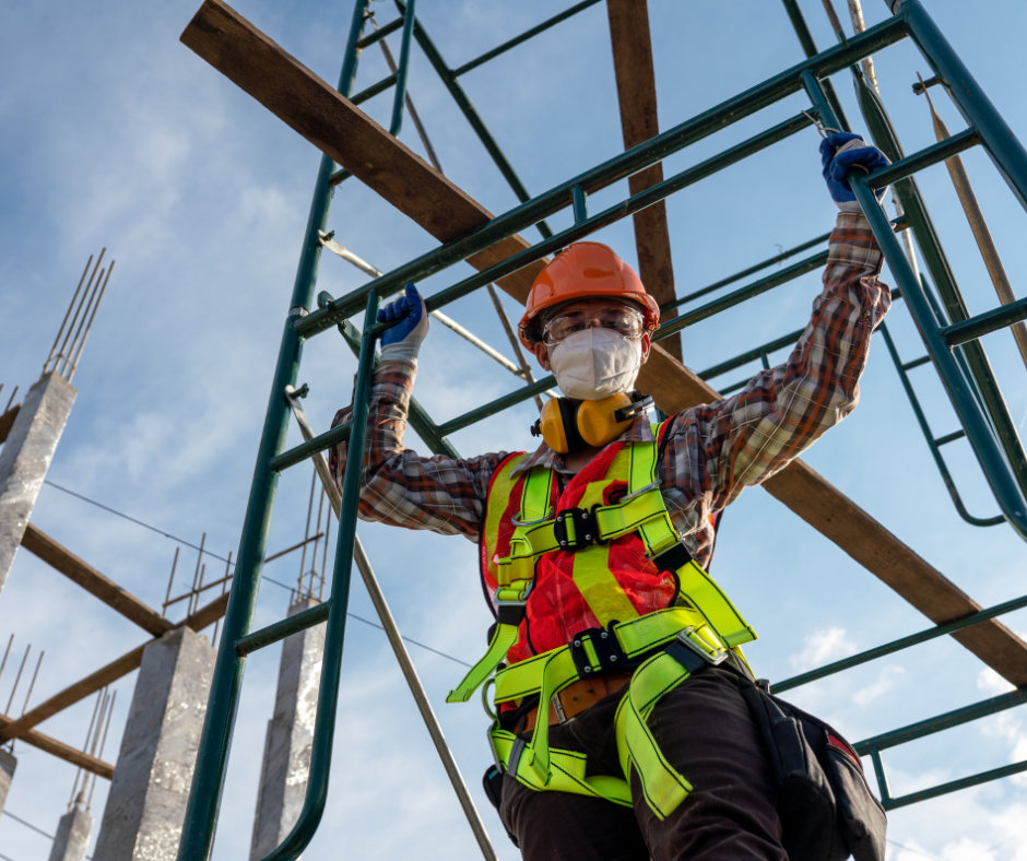 Worker working at height on scaffolding
