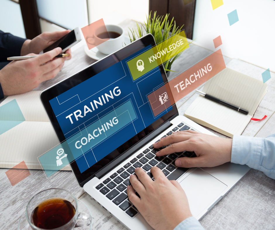 Person typing on a keyboard, 'training' 'coaching' 'teaching' 'knowledge' overlaid