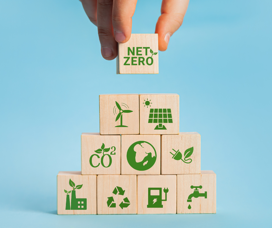 stack of wooden blocks with environmental symbols on them