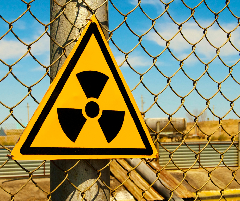 radioactive sign on fence
