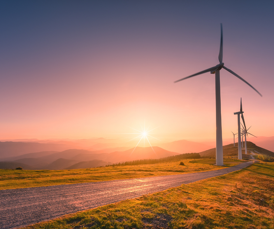 wind turbines at sunset