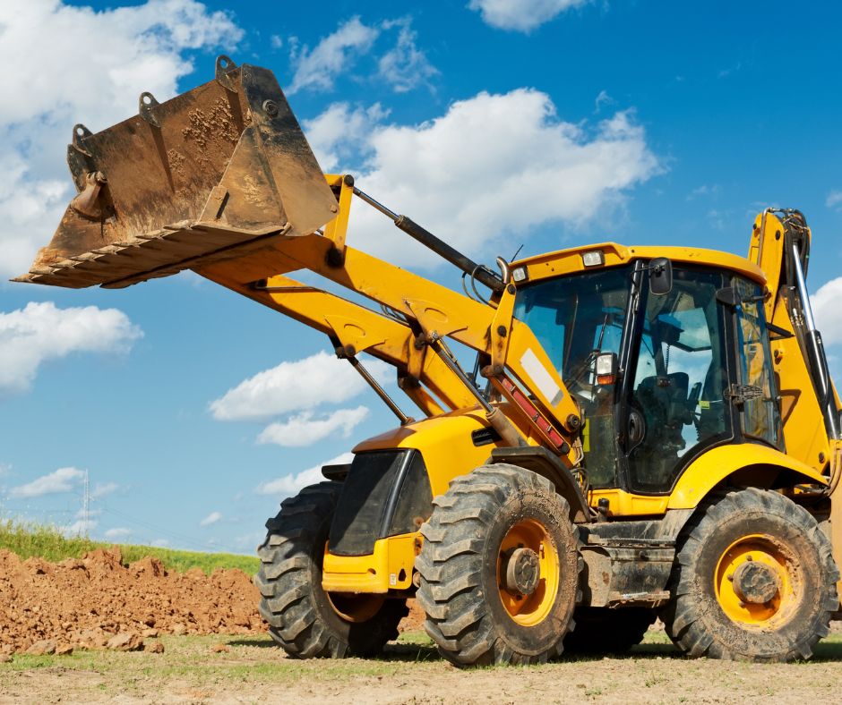 yellow excavator loader